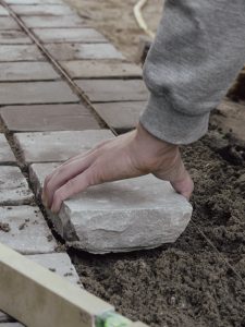 Bestrating leggen